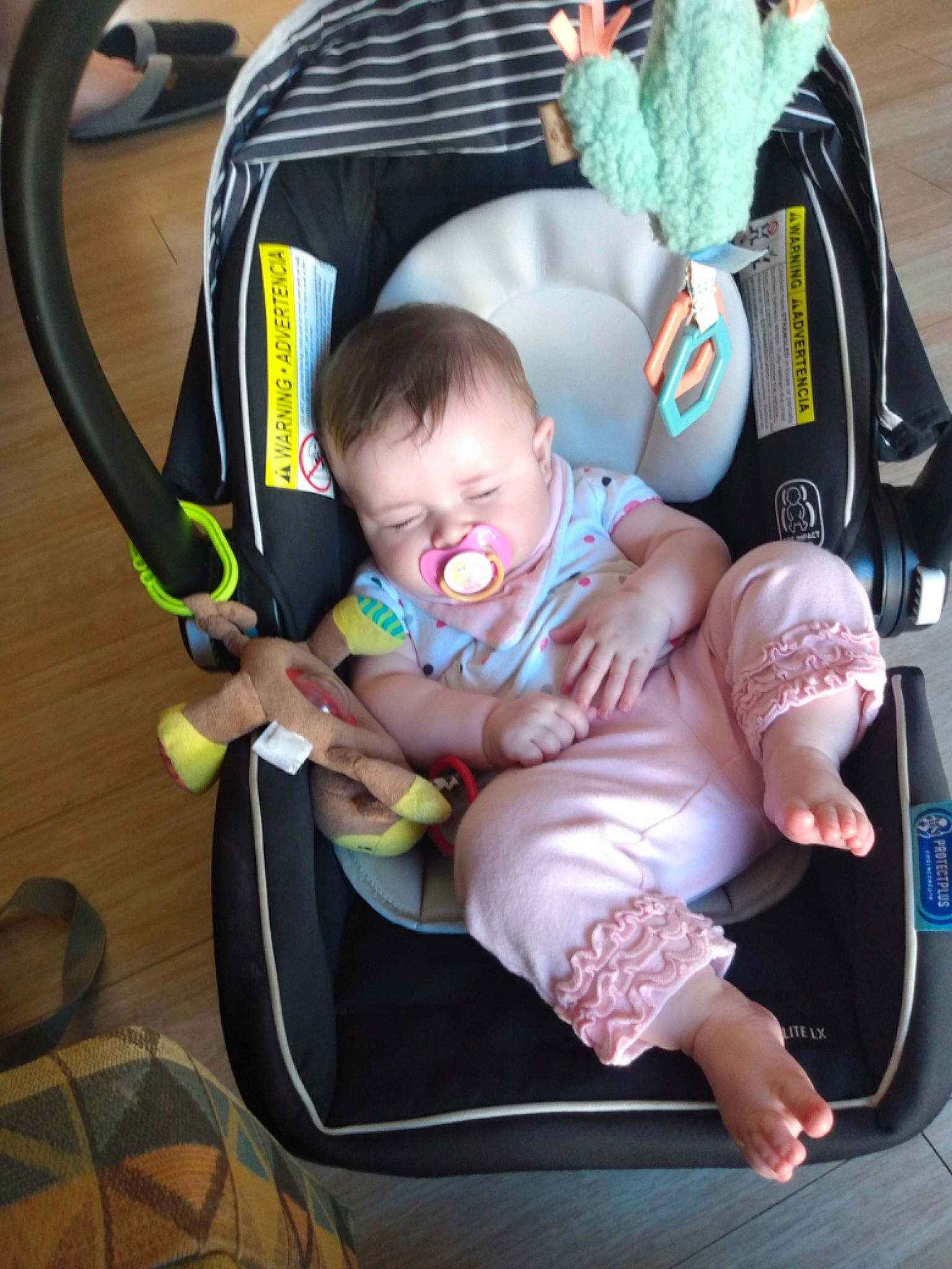 Arleigh is registered to the contest to win money with this photo: baby, baby_carriage, baby_in_car_seat, baby_products, baby_toddler_clothing, bag, car_seat, chair, child, comfort, finger, hairstyle, hand, lap, leg, mammal, person, sitting, snapshot, thigh