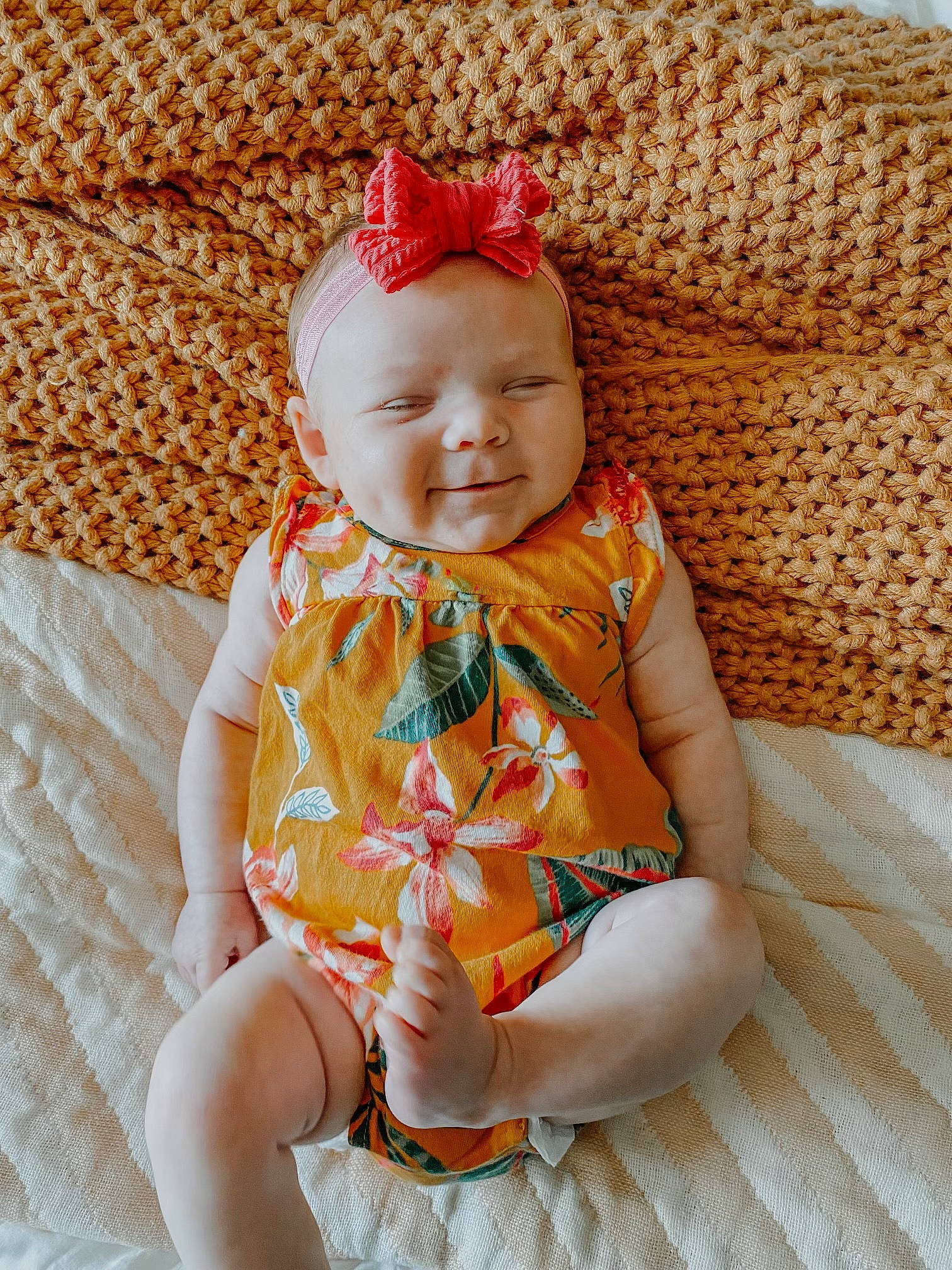 Autymn joined the competition — help win amazing prizes! baby, baby_toddler_clothing, child, comfort, dress, eye, fashion_accessory, fun, happy, head, human_body, orange, pattern, peach, person, sitting, skin, sleeve, smile, textile