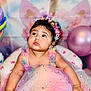 baby, child, toddler, dress, headband, flowers, balloons, unicorn, party, celebration, pastel_colors, curly_hair, chair, cute, smiling, indoor, portrait, colorful, decorations, happy