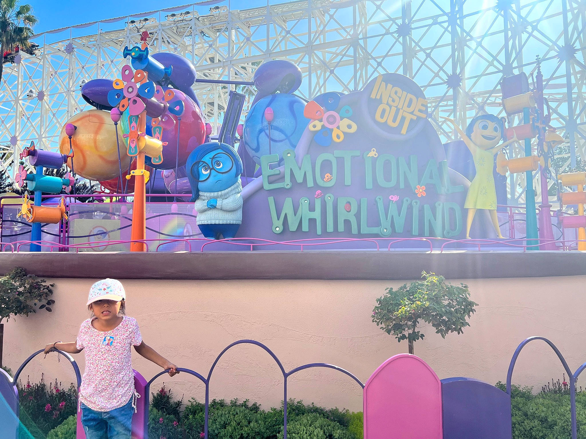 Sophia joined the competition — help win amazing prizes! art, blue, community, event, facade, font, fun, hat, headwear, leisure, magenta, person, pink, plant, public_space, recreation, shorts, signage, summer, sunglasses