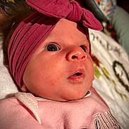 Autumn joined the competition — help win amazing prizes! baby, infant, headband, pink, clothing, face, eyes, skin, portrait, closeup, cute, expression, soft, newborn, child, indoors, blanket, fabric, apparel, person