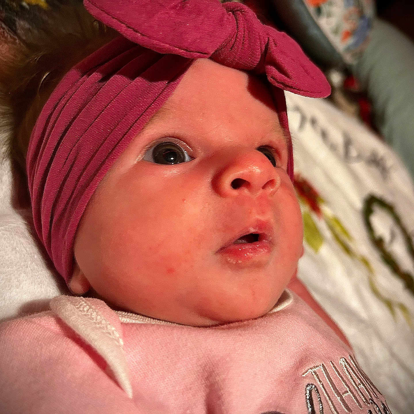 Autumn joined the competition — help win amazing prizes! apparel, baby, blanket, child, closeup, clothing, cute, expression, eyes, fabric, face, headband, indoors, infant, newborn, person, pink, portrait, skin, soft
