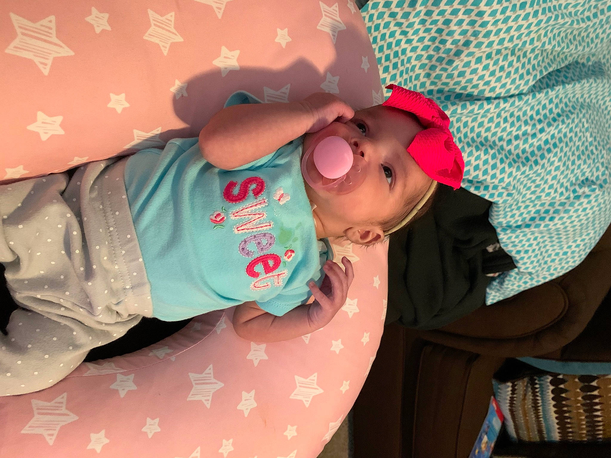 Madison is registered to the contest to win money with this photo: baby, baby_products, baby_toddler_clothing, cap, child, comfort, fashion_accessory, fun, happy, hat, headwear, magenta, pattern, person, pink, sleeve, sun_hat, textile, toddler