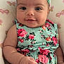 Sienna joined the competition — help win amazing prizes! baby, infant, child, smiling, headband, bow, floral_dress, cute, portrait, closeup, indoors, cushion, pattern, pink, green, skin, face, hand, happy, seated