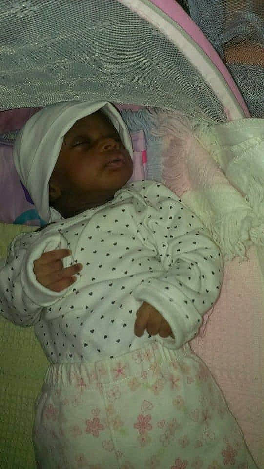 Stephira Baya participe au concours pour gagner de l'argent avec cette photo : baby, baby_products, baby_safety, baby_sleeping, baby_toddler_clothing, bedding, bedtime, blanket, child, comfort, facial_expression, linens, mammal, pattern, person, pink, room, skin, sleeve, textile