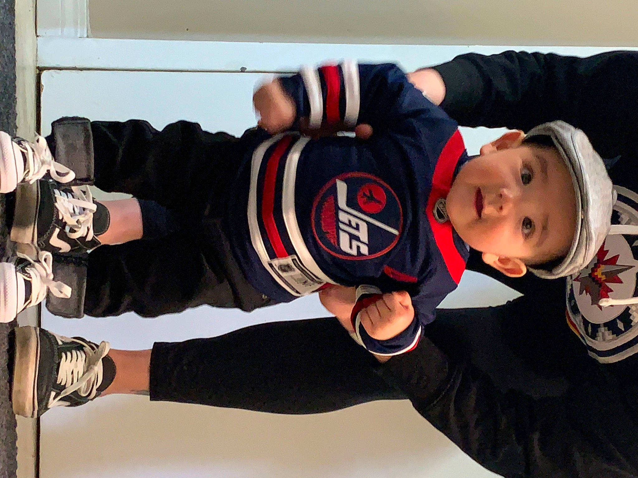 Kayleb is registered to the contest to win money with this photo: baby, baby_toddler_clothing, carmine, costume, event, fun, gesture, hat, headwear, jacket, knee, person, player, sleeve, sock, sports_gear, sports_uniform, sportswear, team_sport, thigh