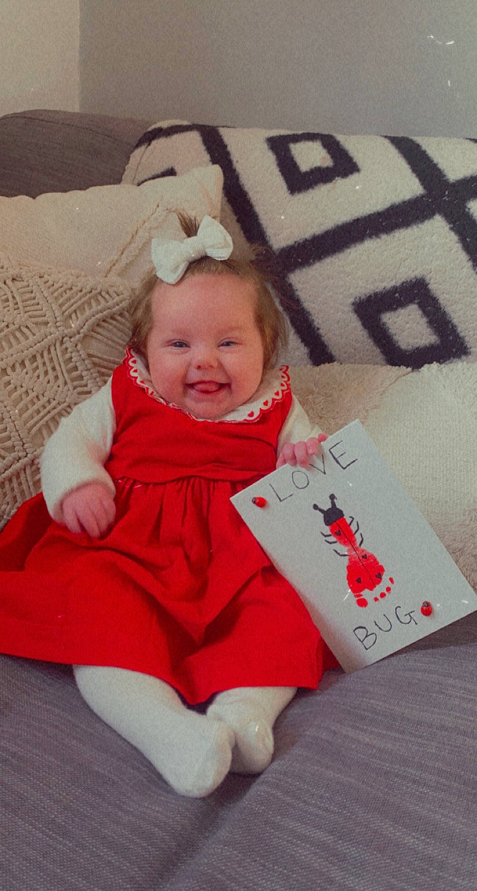 Ada joined the competition — help win amazing prizes! baby, baby_toddler_clothing, carmine, child, christmas, christmas_eve, comfort, costume_hat, font, happy, holiday, joy, laugh, pattern, person, product, room, sitting, sleeve, smile