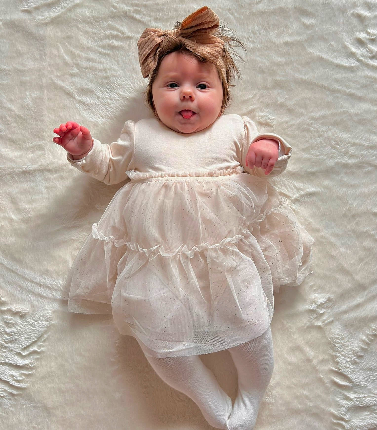 Ada joined the competition — help win amazing prizes! baby, baby_toddler_clothing, blond, bridal_accessory, child, day_dress, dress, embellishment, eye, face, fashion_accessory, hair_accessory, happy, head, headgear, person, pink, sitting, skin, sleeve