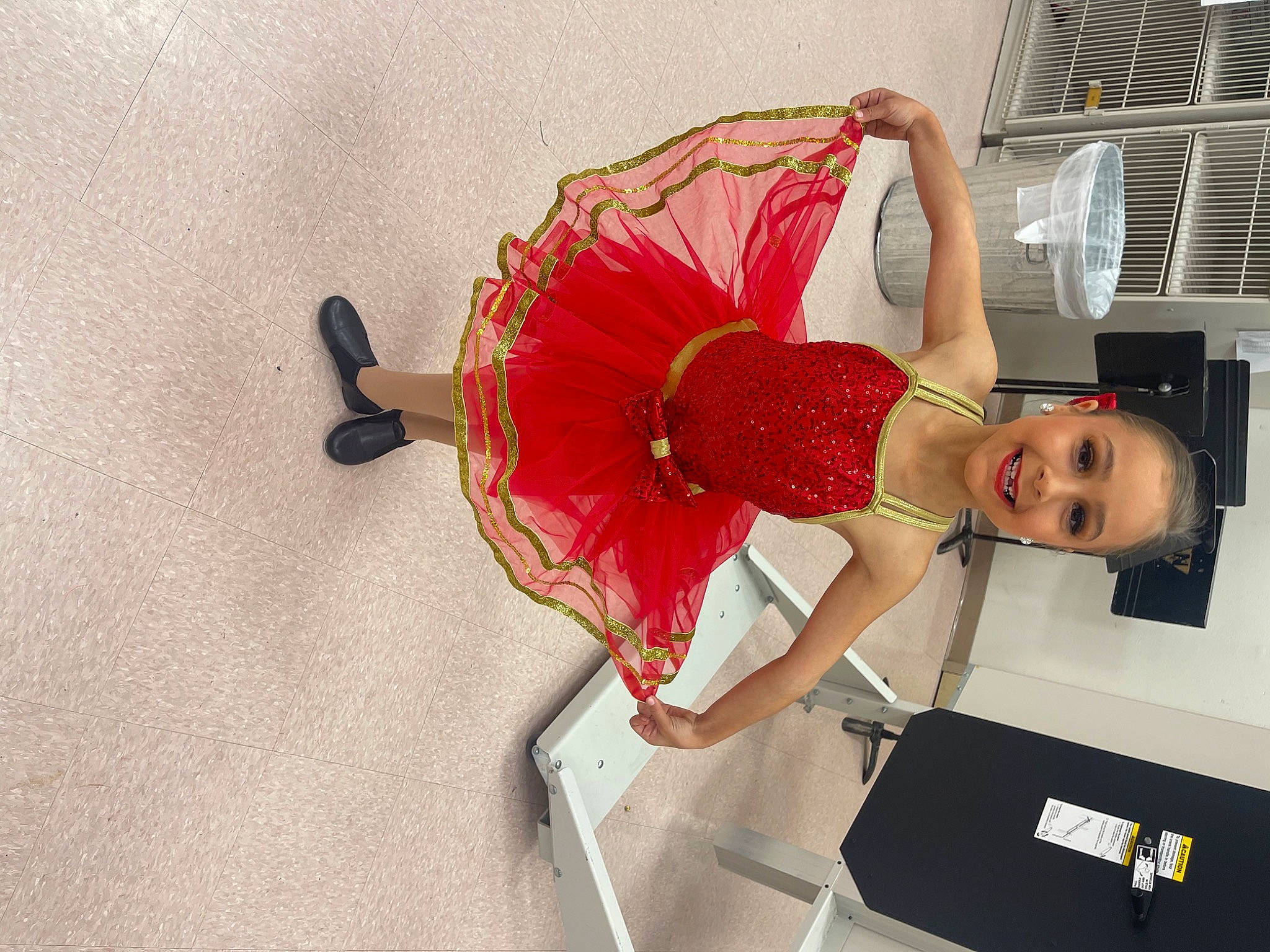 Faithanne is registered to the contest to win money with this photo: abdomen, automotive_design, balance, child, elbow, fashion_design, flesh, flooring, fun, happy, human_leg, joy, knee, leg, magenta, person, room, sandal, shoulder, smile