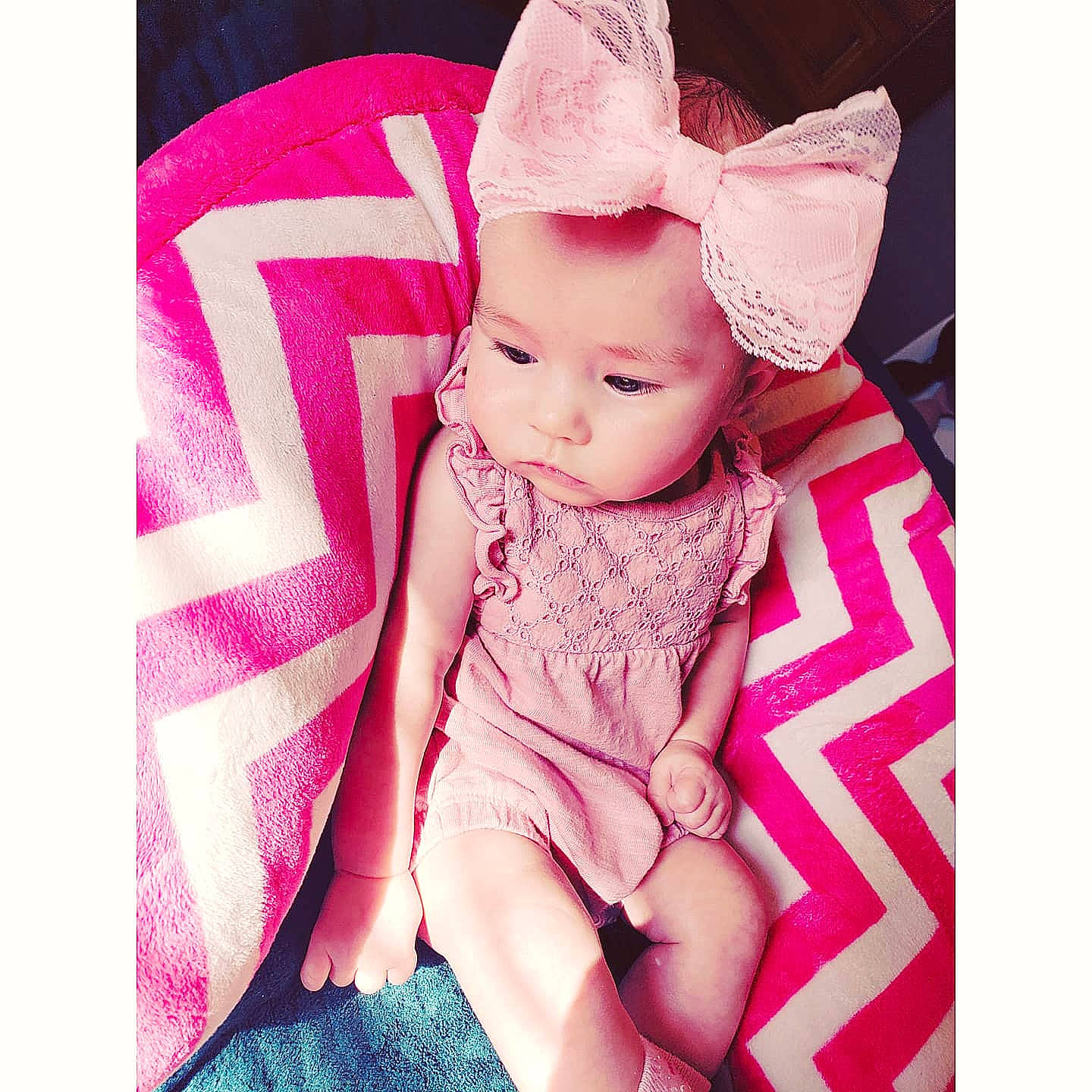 Ashlyn joined the competition — help win amazing prizes! baby, baby_toddler_clothing, cap, comfort, costume_hat, dress, face, finger, happy, head, headwear, human_body, magenta, pattern, person, pink, product, purple, sleeve, textile