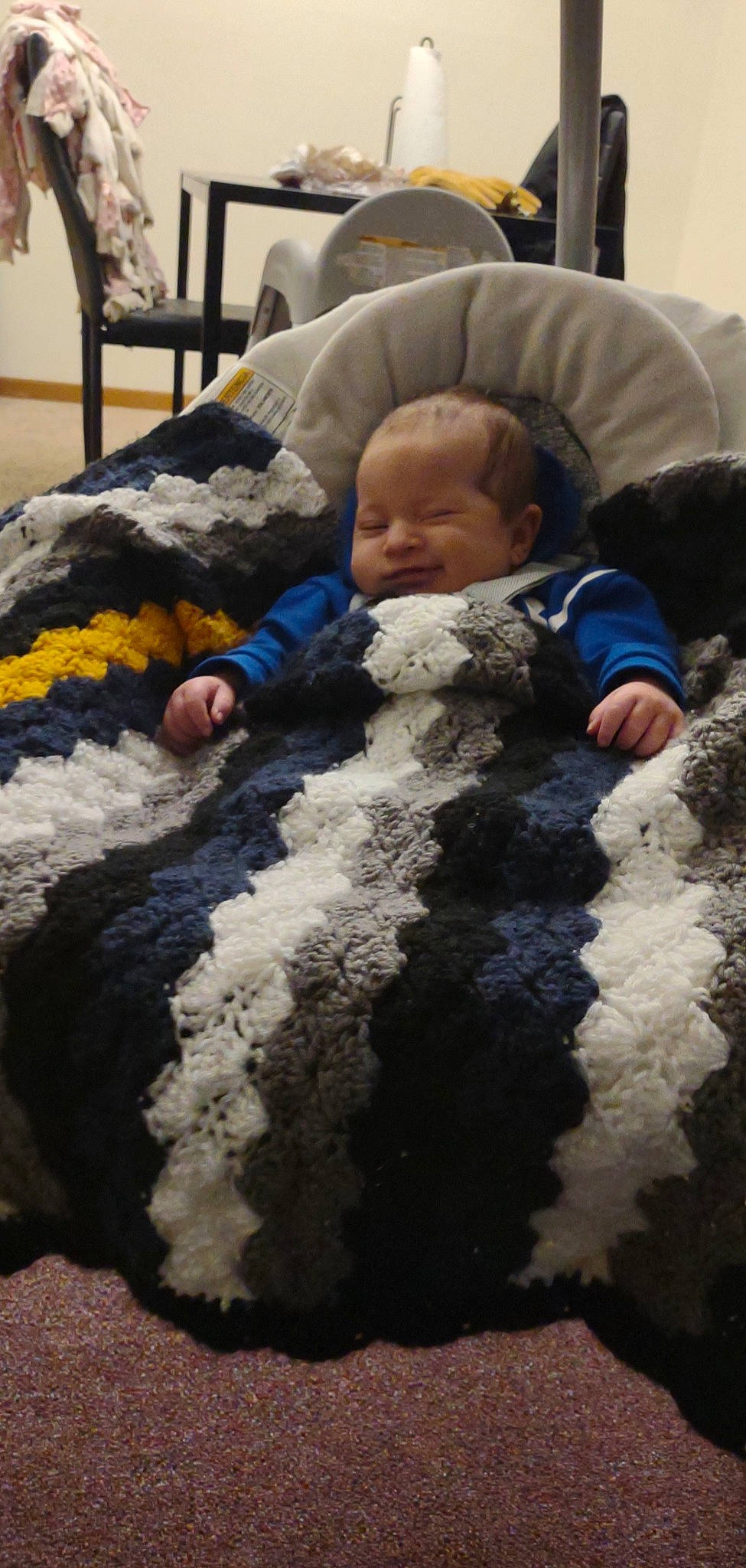 Malakai joined the competition — help win amazing prizes! baby, baby_products, baby_toddler_clothing, blanket, child, comfort, flooring, fun, fur, linens, person, room, sand, sitting, toddler, winter, wool