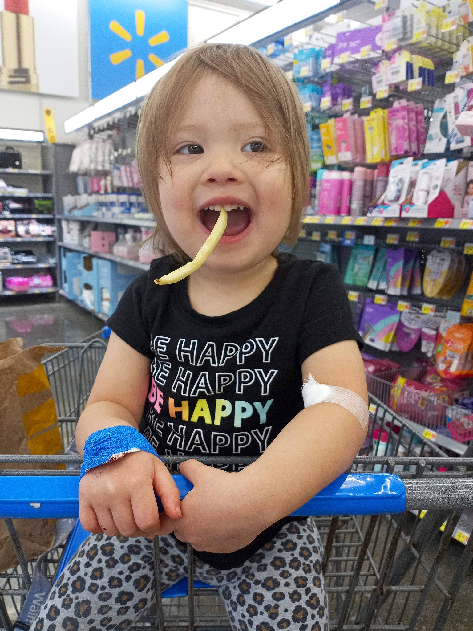 Aubrey is registered to the contest to win money with this photo: blue, blurred, cart, child, convenience_store, customer, fun, grocery_store, happy, market, natural_foods, person, product, retail, service, shelf, shelving, shopping, shopping_cart, snapshot