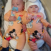 Romy Et Dany a rejoint le concours — aidez-le/la à gagner de superbes lots ! baby, babies, pacifier, baby_nest, mickey_mouse, pajamas, hat, footwear, dog, floor, indoor, person, child, cute, sleepwear, matching_outfits, infant, home, carpet, toy