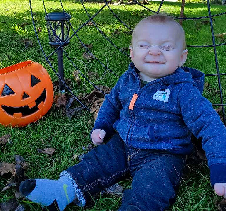 Sylas is registered to the contest to win money with this photo: baby, ball, calabaza, child, cucurbita, football, grass, joy, lawn, leaf, person, plant, play, pumpkin, sitting, smile, toddler, winter_squash, yard