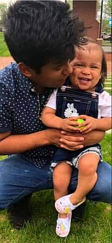 Daniela joined the competition — help win amazing prizes! baby, child, finger, grass, lawn, people, person, plant, play, product, sharing, sitting, thumb, toddler