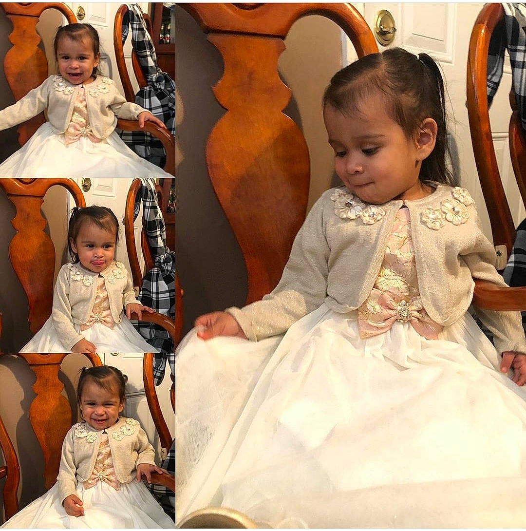 Daniela joined the competition — help win amazing prizes! baby, ceremony, child, dress, family, fashion, formal_wear, gown, hairstyle, joy, person, sitting, toddler, tradition