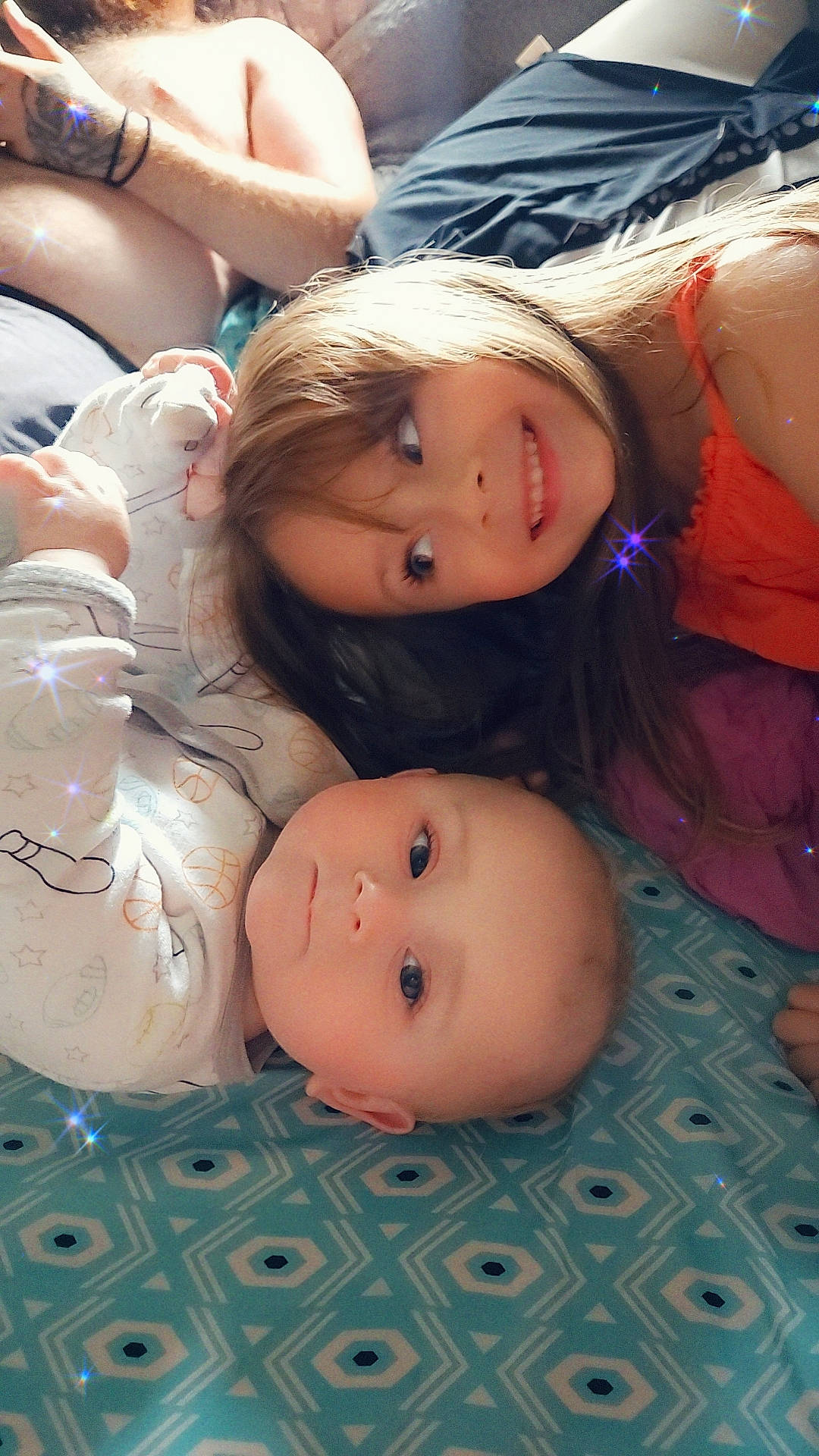 Emery is registered to the contest to win money with this photo: baby, baby_toddler_clothing, cheek, child, comfort_food, foot, fun, grass, happy, joy, nose, person, skin, toddler