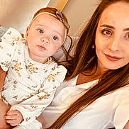 Jetmela is registered to the contest to win money with this photo: baby, blanket, blonde, blouse, childbirth, clothing, face, family, hair, happy, head, lady, newborn, people, person, photography, portrait, selfie, smile, t_shirt