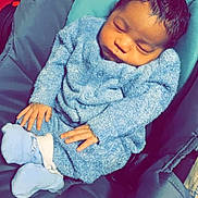 Jalila is registered to the contest to win money with this photo: architecture, baby, blanket, building, clothing, cushion, face, furniture, glove, happy, head, homedecor, hospital, newborn, pants, person, photography, portrait, sleeping, smile