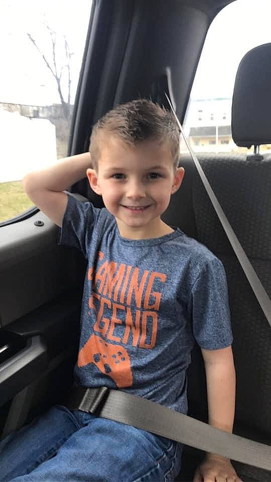 Kase is registered to the contest to win money with this photo: auto_part, automotive_window_part, car, car_seat, child, driving, family_car, hair, hairstyle, joy, luxury_vehicle, person, seat_belt, smile, t_shirt, toddler, vacation, vehicle, vehicle_door