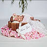 Kinsley is registered to the contest to win money with this photo: newborn, baby, sleeping, lace, wooden_bowl, flower_crown, pink_flowers, white_ribbon, tag, portrait, soft_lighting, studio, peaceful, infant, cute, tender, decorative, floral, resting, adorable