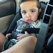 Noah joined the competition — help win amazing prizes! toddler, child, car_seat, toy_story, seat_belt, car_interior, window, clothing, shorts, serious_face, hair, person, hand, head, seat, sitting, safety, young_child, baby, vehicle