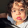 Noah joined the competition — help win amazing prizes! child, toddler, curly_hair, face, brown_eyes, highchair, tray, sunlight, closeup, expression, messy_face, indoor, person, young_child, cute, portrait, curious, baby, skin, clothing