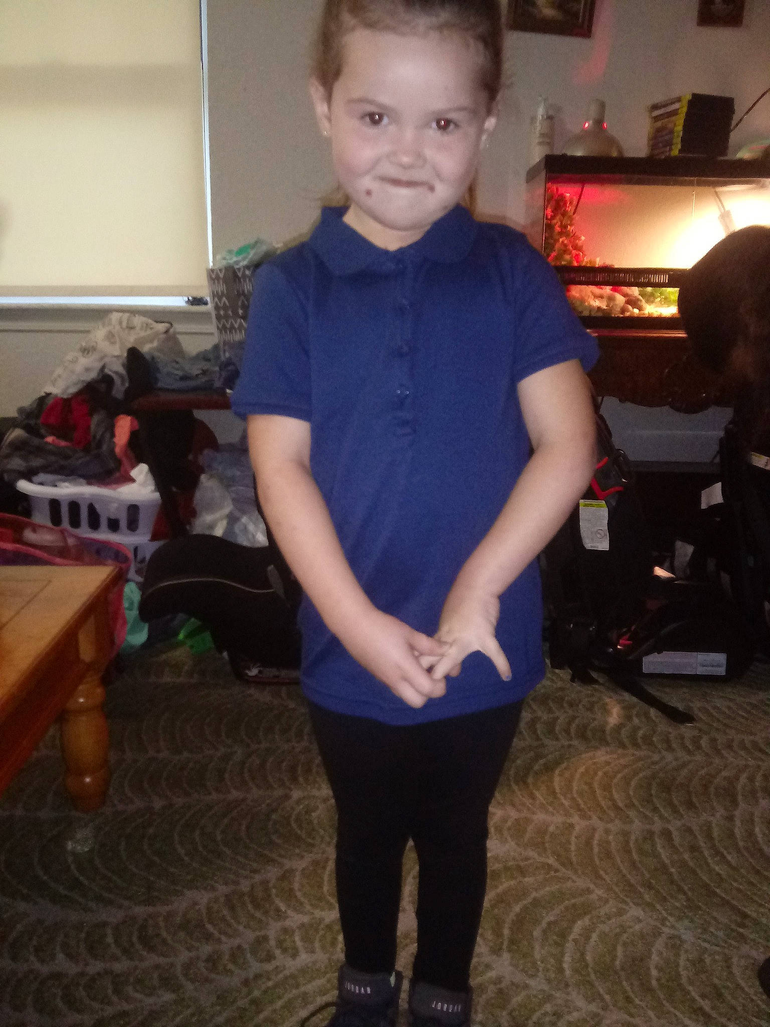 Marissa is registered to the contest to win money with this photo: arm, blue, child, clothing, electric_blue, footwear, joint, joy, leg, leggings, person, shoe, shoulder, sleeve, standing, t_shirt, tights, toddler