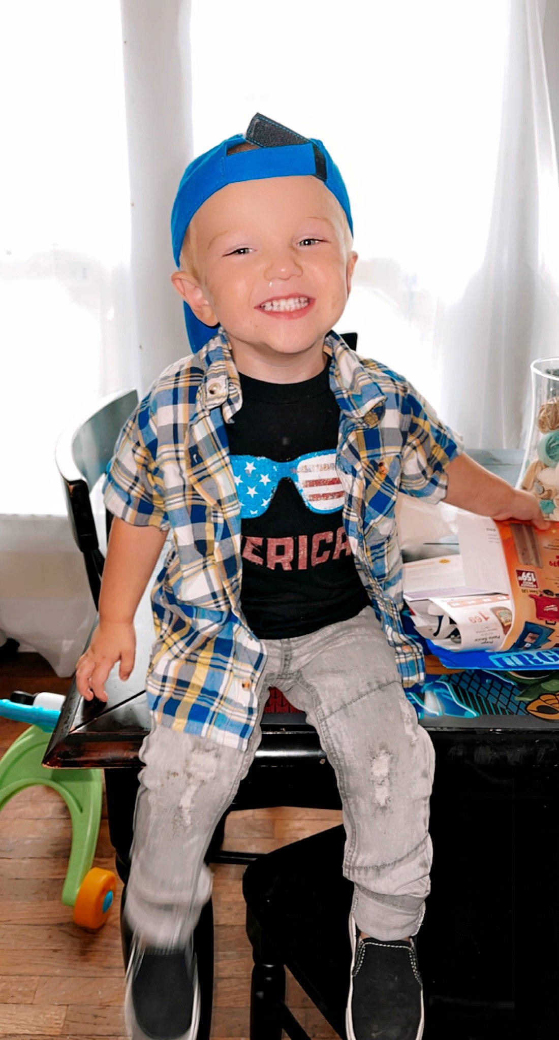 Brayson is registered to the contest to win money with this photo: baby_toddler_clothing, baseball_cap, cap, child, clothing, cool, facial_expression, fashion, happy, headwear, joy, orange, person, photograph, shoe, sleeve, smile, sneakers, standing, street_fashion