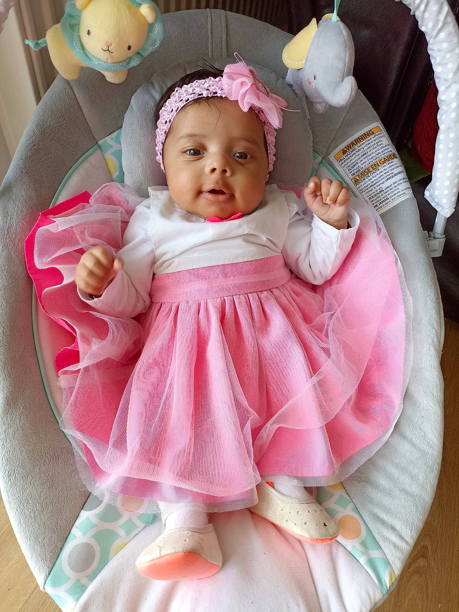 Inaya a rejoint le concours — aidez-le/la à gagner de superbes lots ! baby, baby_safety, baby_toddler_clothing, cheek, child, comfort, dress, facial_expression, fun, happy, headgear, headwear, magenta, person, pink, product, skin, sleeve, smile, textile