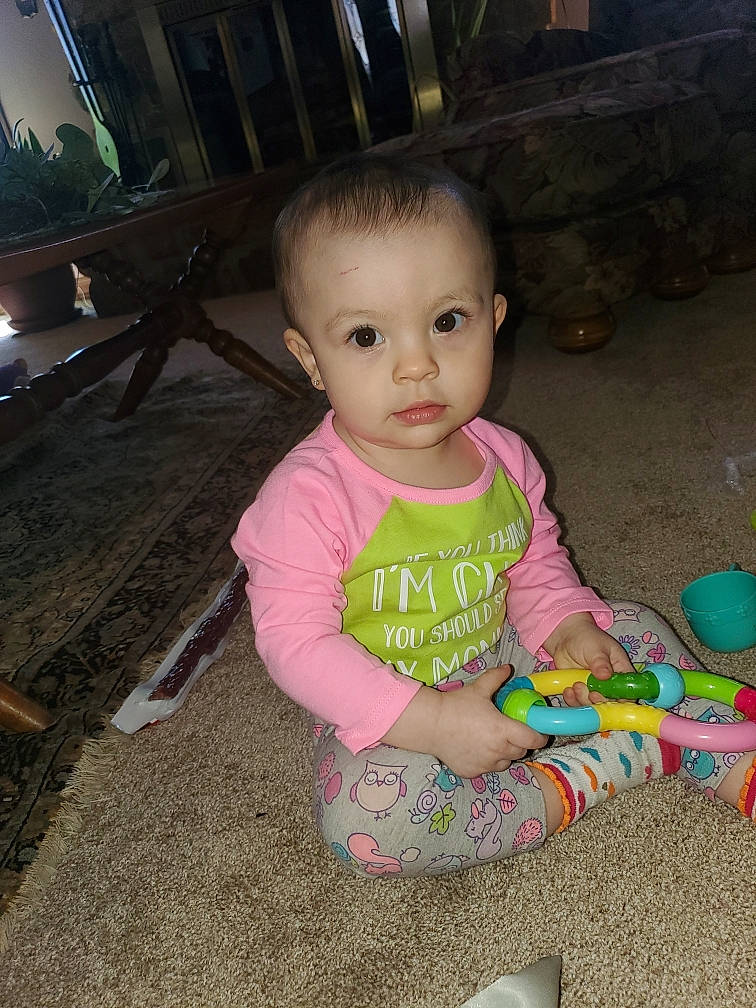 Jaylee joined the competition — help win amazing prizes! baby, baby_products, baby_toddler_clothing, cheek, child, flooring, fun, grass, hardwood, magenta, person, pink, play, sitting, skin, sleeve, t_shirt, toddler, vacation, wood