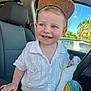 child, toddler, smile, blue_eyes, hat, cap, white_shirt, car_interior, car_seat, steering_wheel, plush_toy, stuffed_animal, sunlight, window, palm_tree, portrait, happy, hands, cheeks, teeth
