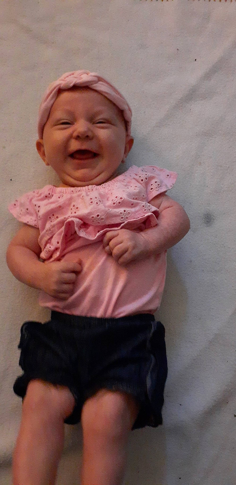 Adelyn joined the competition — help win amazing prizes! baby, baby_toddler_clothing, comfort, elbow, finger, fun, gesture, happy, headgear, human_body, lip, mouth, neck, nose, person, pink, skin, sleeve, smile, thumb