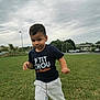 Baha a rejoint le concours — aidez-le/la à gagner de superbes lots ! child, boy, grass, outdoor, cloudy_sky, casual_clothing, curious, shirt, pants, playful, daylight, nature, young_child, motion, lawn, street_lamp, park, car, trees, exploration