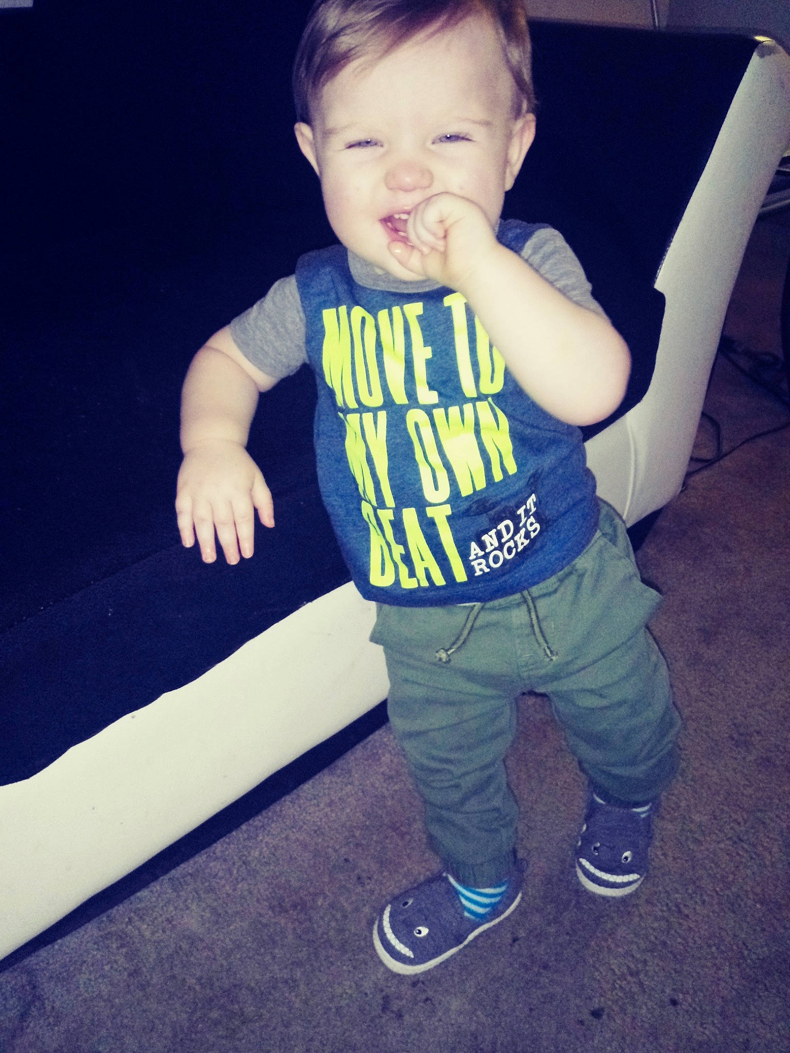 Cayden is registered to the contest to win money with this photo: arm, baby, cheek, child, cloud, cool, eye, face, fun, hand, head, leg, person, play, product, skin, smile, standing, t_shirt, toddler