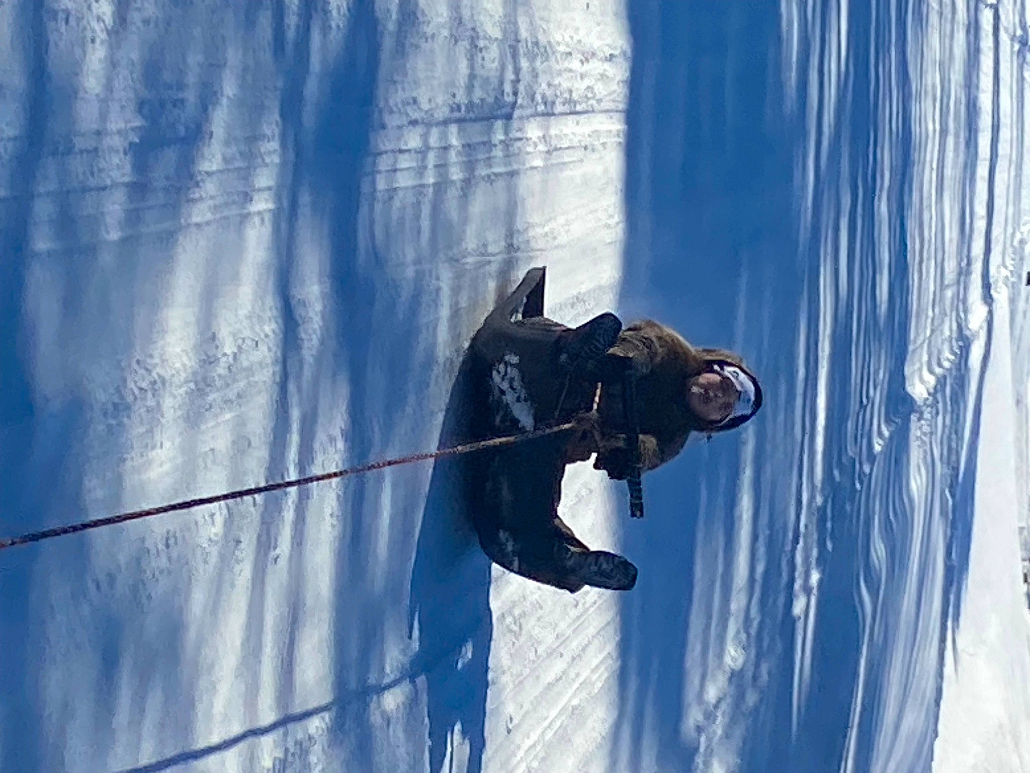 Abbie is registered to the contest to win money with this photo: adventure, electric_blue, extreme_sport, freezing, frost, fun, geological_phenomenon, glacial_landform, glove, goggles, ice_cap, leisure, person, recreation, shadow, sky, slope, snow, tree, winter