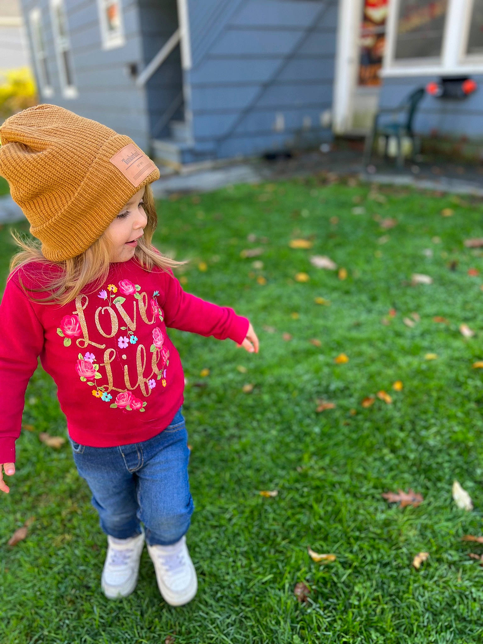 Marianna is registered to the contest to win money with this photo: baby_toddler_clothing, cap, child, clothing, fun, grass, grassland, groundcover, happy, hat, headwear, jacket, jeans, lawn, leaf, leisure, magenta, people_in_nature, person, plant