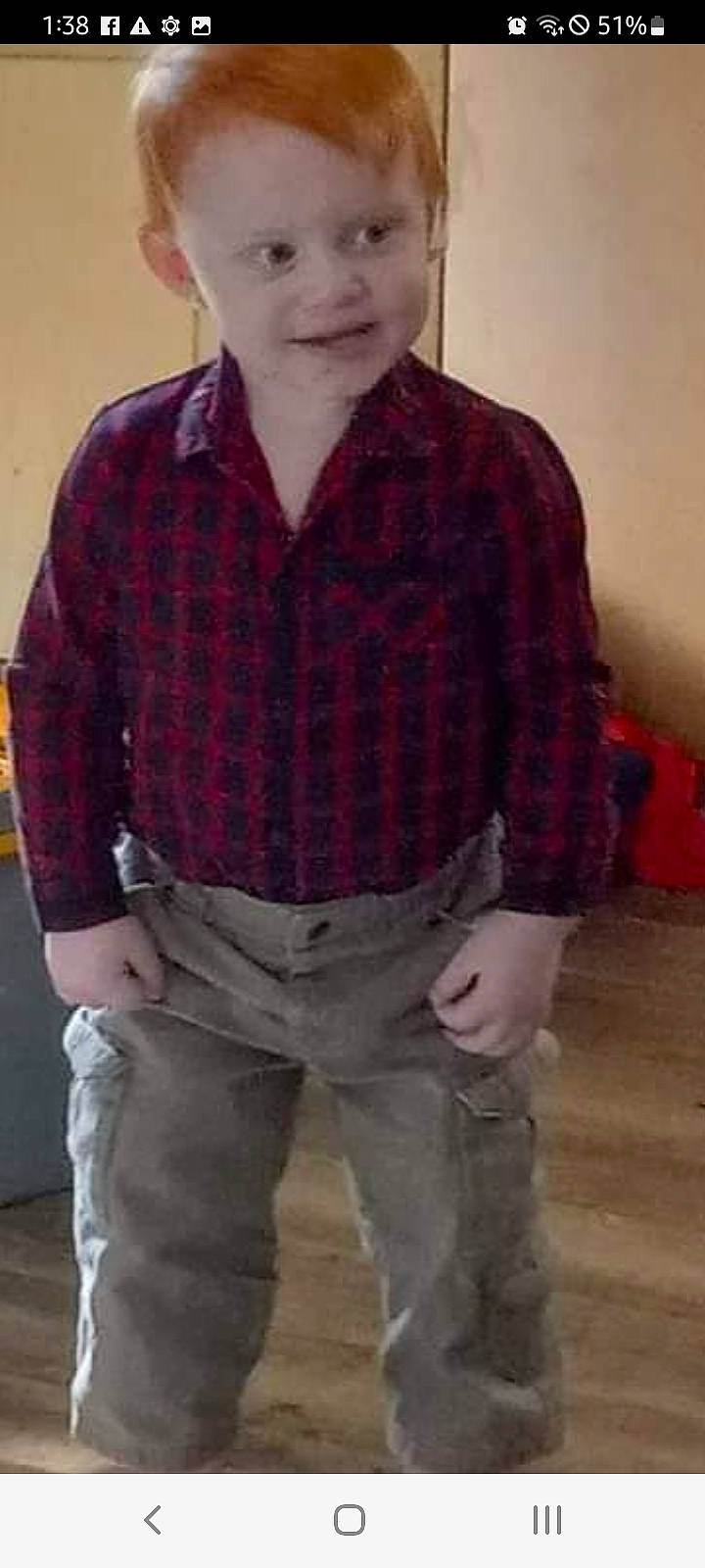 Cameron is registered to the contest to win money with this photo: belt, blazer, button, chest, collar, denim, dress_shirt, eyewear, fashion_design, grey, joy, outerwear, pattern, person, plaid, sleeve, standing, tartan, vintage_clothing, vision_care