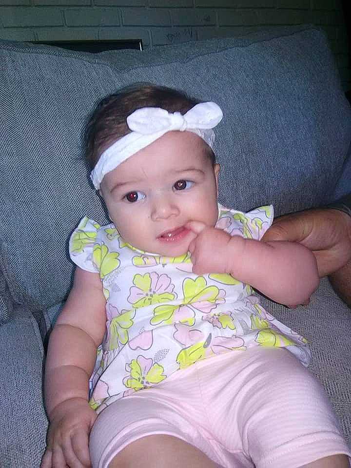 Raegan joined the competition — help win amazing prizes! baby, baby_toddler_clothing, child, headgear, leg, person, sitting, skin, smile, toddler