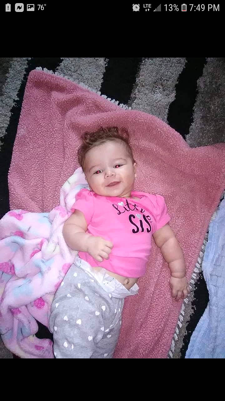 Raegan is registered to the contest to win money with this photo: baby, baby_products, baby_toddler_clothing, cheek, child, person, pink, product, skin, smile, toddler