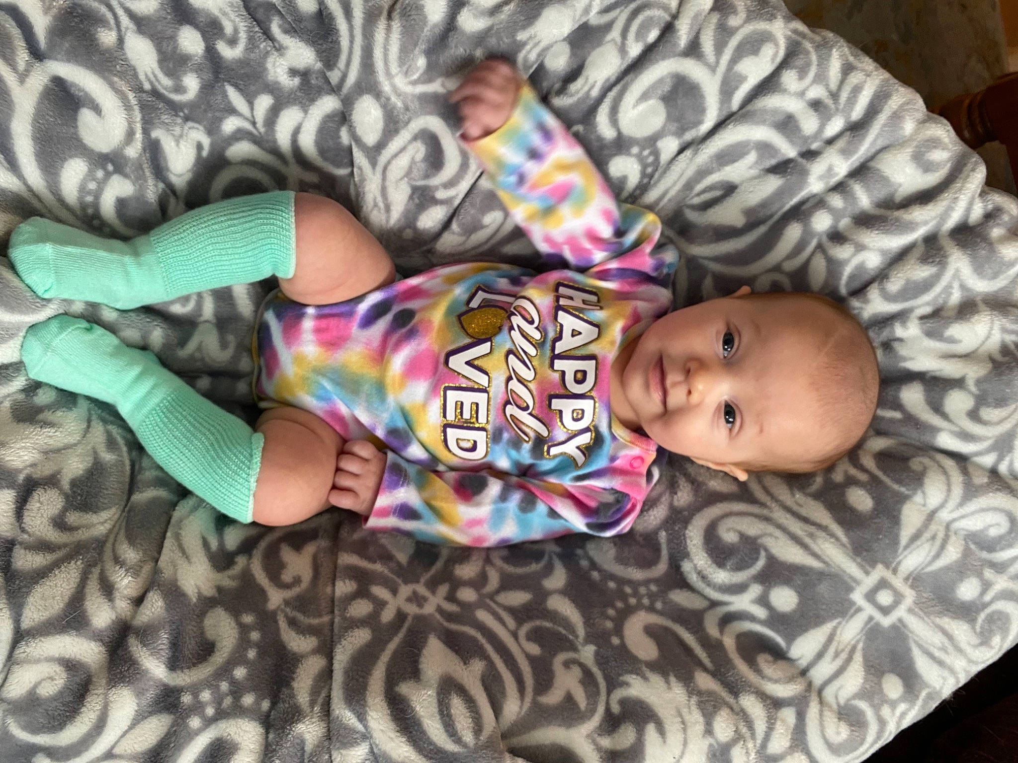 Vivian joined the competition — help win amazing prizes! arm, baby, baby_toddler_clothing, cheek, comfort, eye, finger, hand, head, human_body, mammal, nose, person, pink, skin, sleeve, smile, textile, toddler, vertebrate