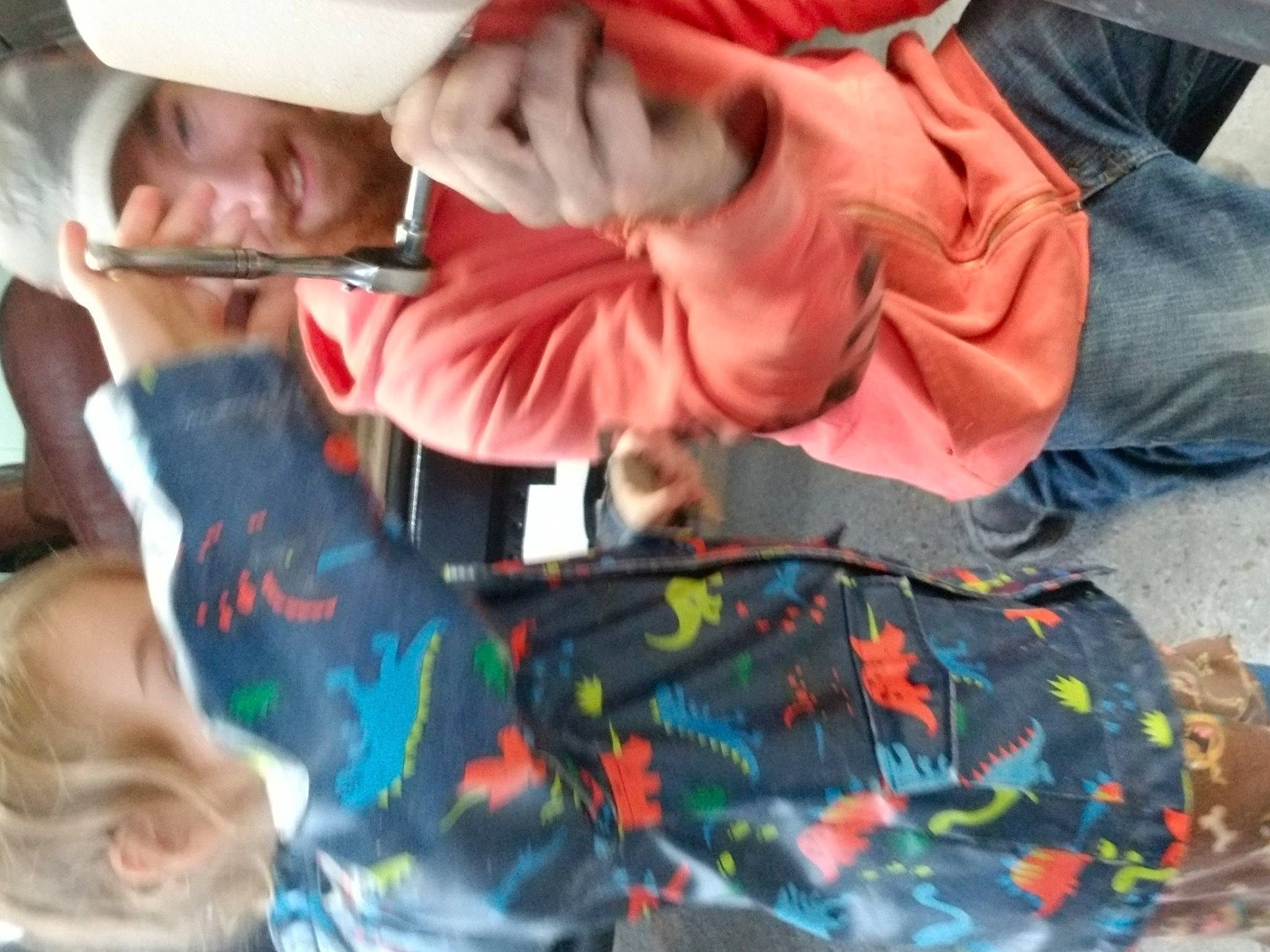 Clarke is registered to the contest to win money with this photo: child, event, fun, gesture, hat, headwear, leisure, linens, mouth, pattern, person, plant, room, tradition, tree