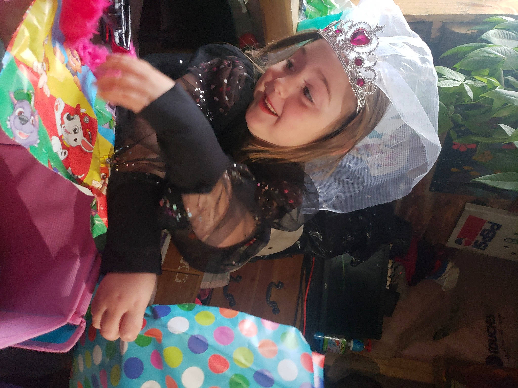 Christina is registered to the contest to win money with this photo: adaptation, bracelet, child, event, fashion_accessory, festival, fun, happy, headwear, holiday, houseplant, jewellery, joy, leisure, pattern, person, plant, room, smile, t_shirt