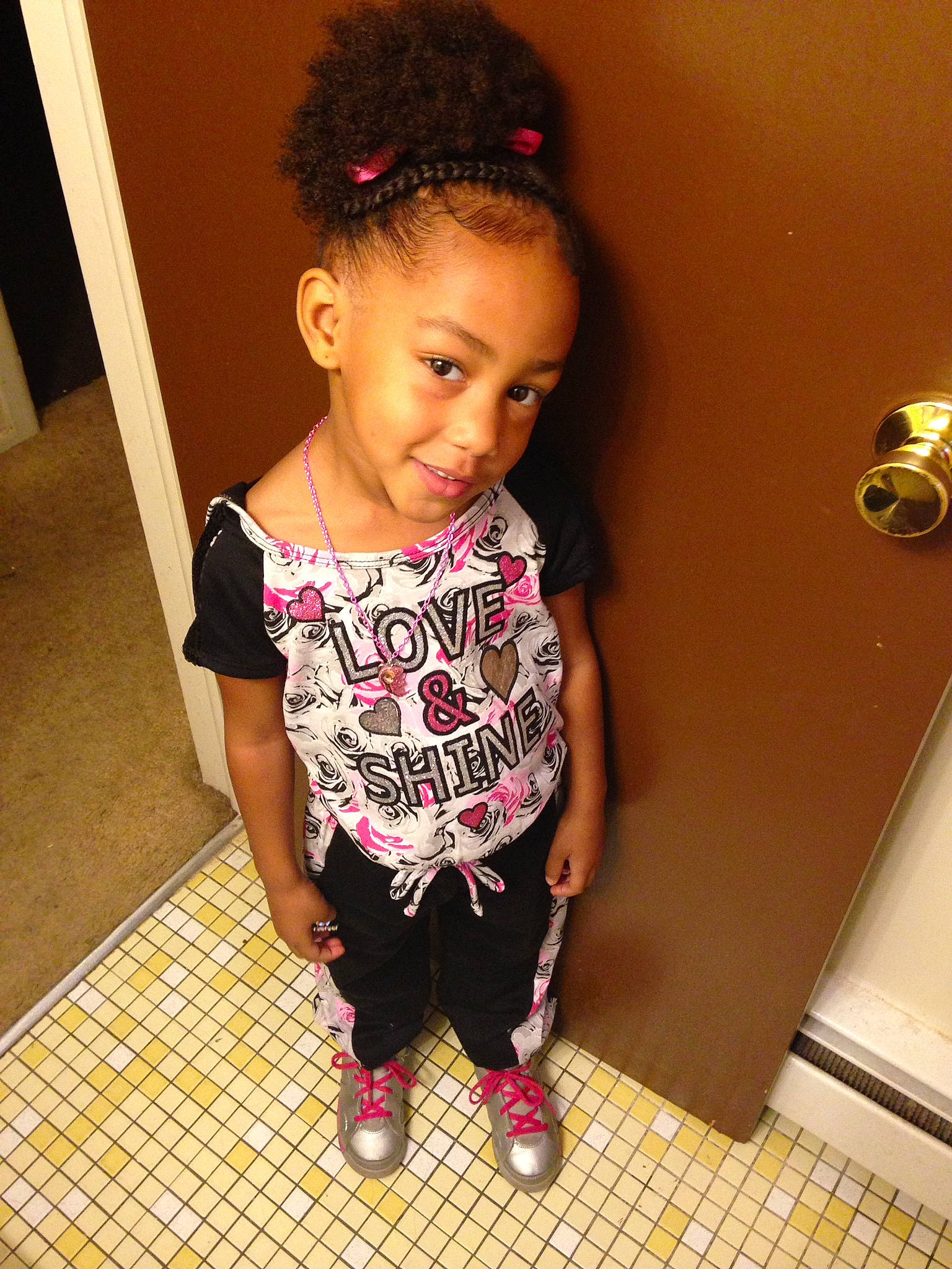 Laniyah is registered to the contest to win money with this photo: arm, baby_toddler_clothing, black_hair, cool, face, facial_expression, hair, hairstyle, happy, human_body, joint, joy, leg, neck, person, pink, shoulder, skin, sleeve, t_shirt