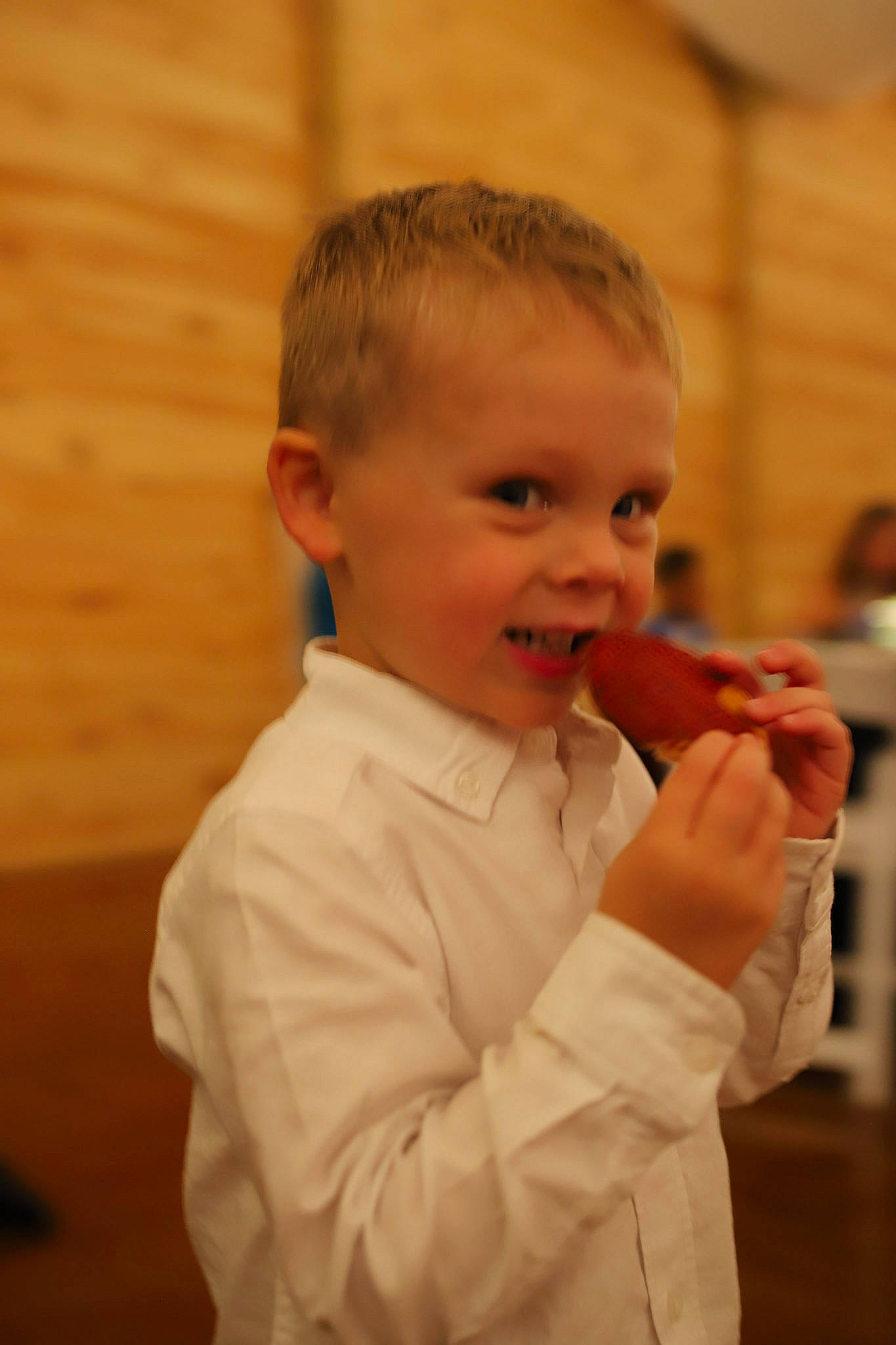 Mason is registered to the contest to win money with this photo: baby, baby_toddler_clothing, cheek, chin, dress_shirt, event, facial_expression, flooring, formal_wear, fun, gesture, happy, hardwood, nose, person, sitting, sleeve, smile, suit, toddler