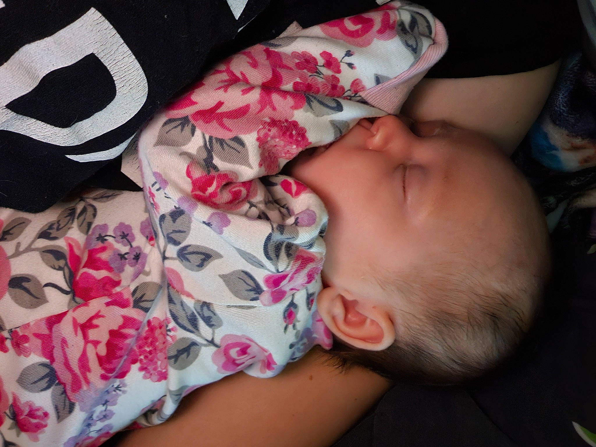 Kenzlee is registered to the contest to win money with this photo: arm, baby, baby_toddler_clothing, cheek, comfort, eye, eyelash, facial_expression, finger, hand, human_body, lip, mammal, mouth, neck, nose, person, plant, skin, sleeve