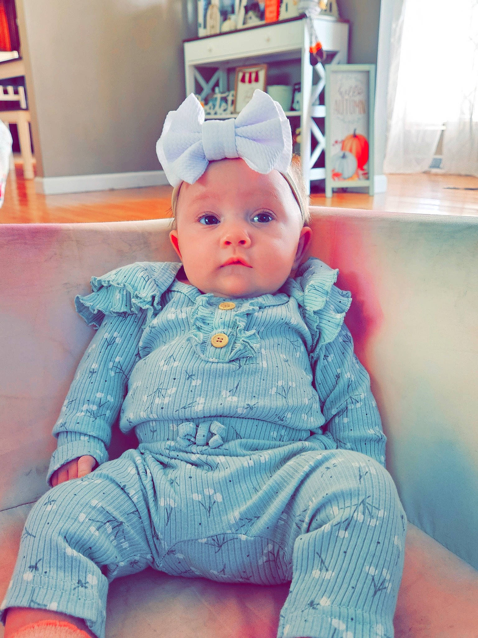 Kenzlee is registered to the contest to win money with this photo: baby, baby_toddler_clothing, cap, child, denim, doll, electric_blue, eye, fashion_accessory, fun, happy, head, headwear, orange, pattern, person, room, sitting, sleeve, standing