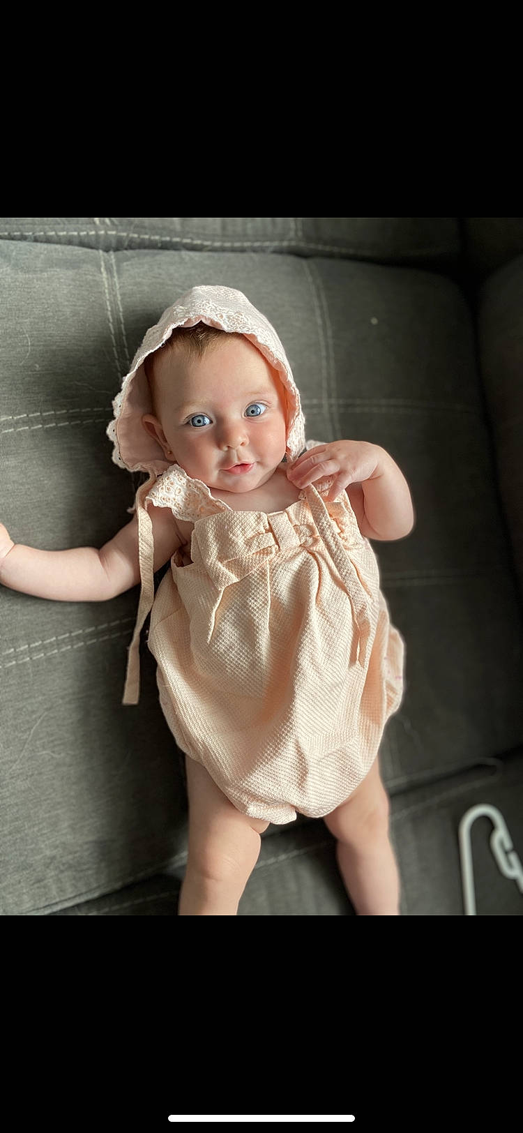 Louisa is registered to the contest to win money with this photo: baby, beige, blond, brown_hair, cheek, child, doll, dress, hand, head, headgear, person, pink, skin, toddler, toy