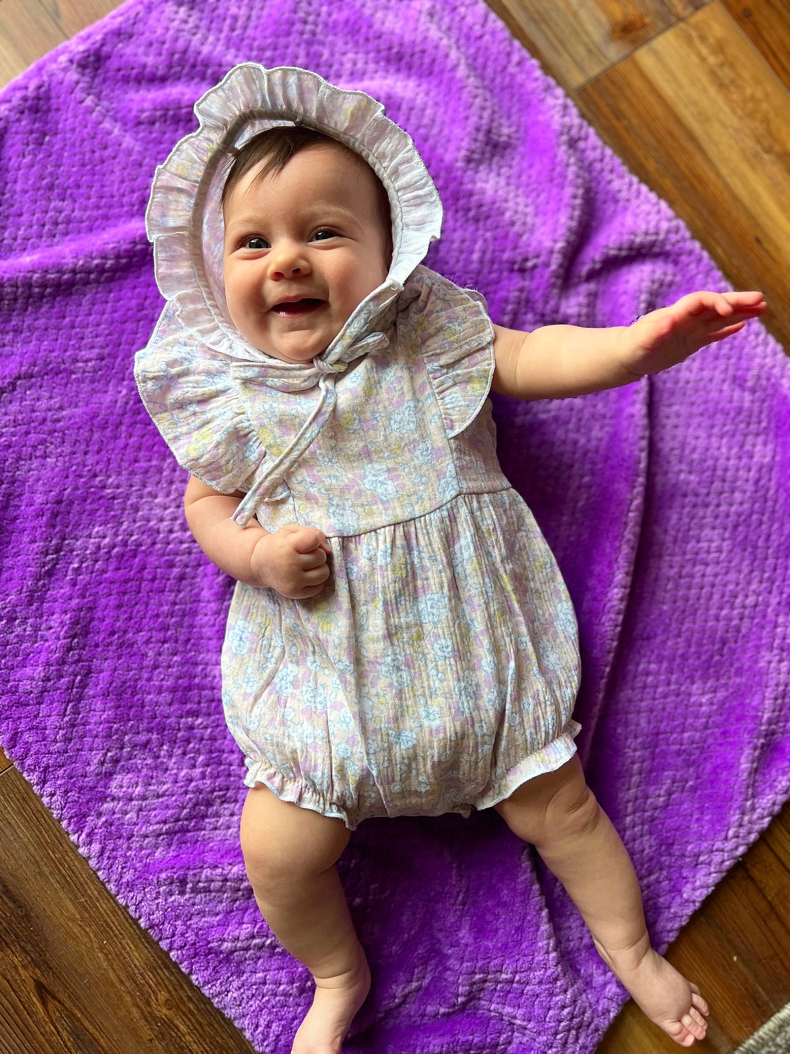 Brynleigh is registered to the contest to win money with this photo: baby, baby_products, baby_toddler_clothing, child, comfort, dress, eye, face, happy, headgear, linens, magenta, pattern, person, pink, purple, skin, sleeve, smile, toddler