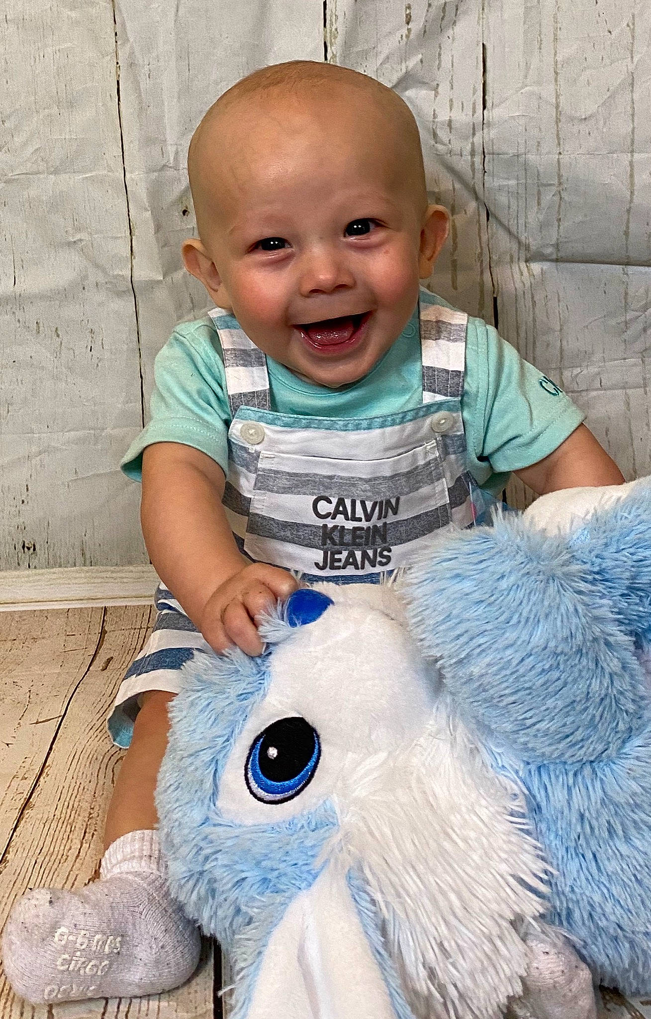 Jensen joined the competition — help win amazing prizes! baby, baby_products, baby_toddler_clothing, blue, cheek, child, eye, face, head, iris, nose, person, photography, product, skin, smile, t_shirt, toddler, turquoise